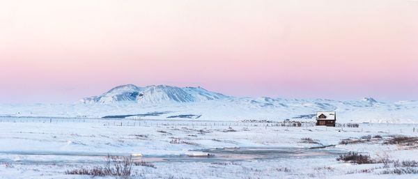 Scenic view of snow covered landscape