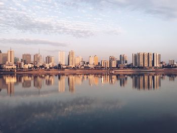 Reflection of buildings on river