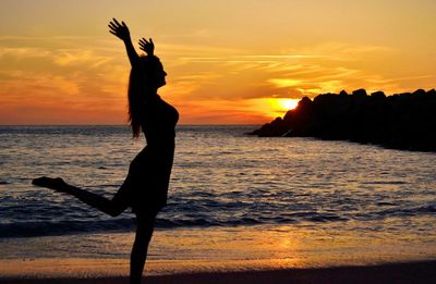 Scenic view of sea at sunset