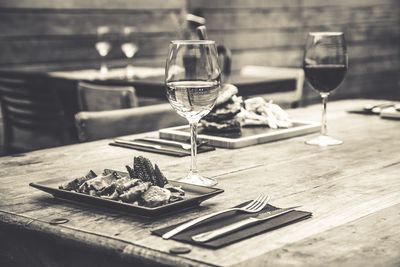 Close-up of wine served on table