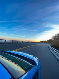 View of road against blue sky