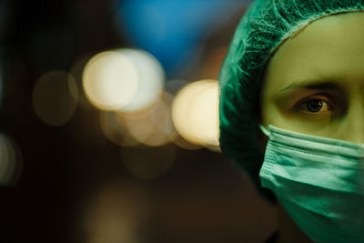 Close-up of woman wearing hat