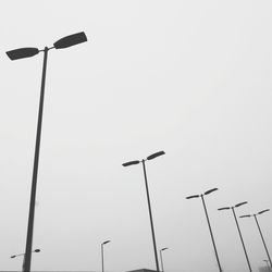 Low angle view of street light against clear sky