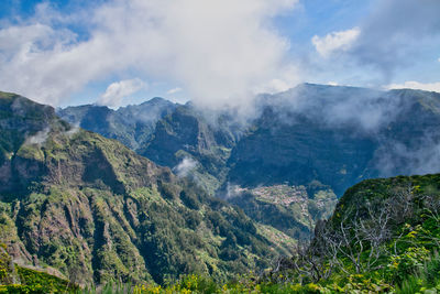 Panoramic view of landscape and mountains against sky