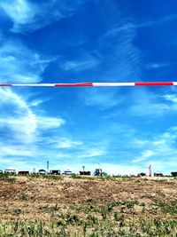 Field against blue sky