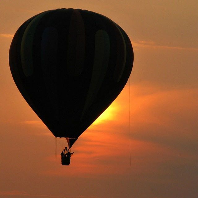 sunset, sky, transportation, orange color, flying, low angle view, mode of transport, air vehicle, mid-air, cloud - sky, hot air balloon, airplane, travel, scenics, outdoors, sun, nature, beauty in nature, no people, cloud