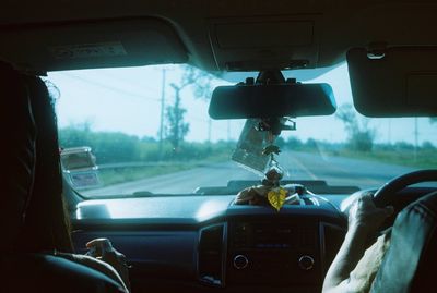 Road seen through car windshield