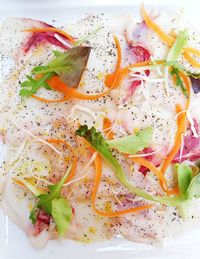 High angle view of chopped vegetables in plate