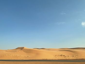 Scenic view of desert against sky