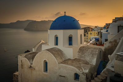 Church against sky during sunset