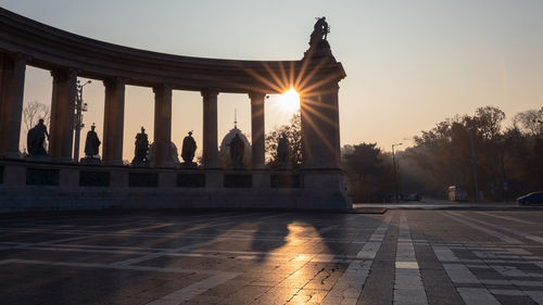 Silhouette of historical building against sky during sunset