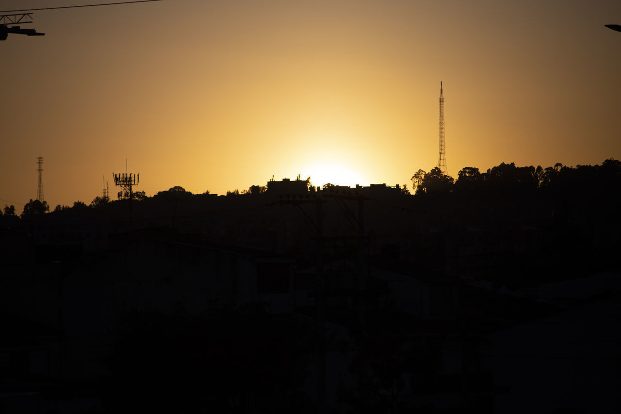 SILHOUETTE OF BUILDINGS DURING SUNSET