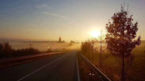 Road against sky during sunset