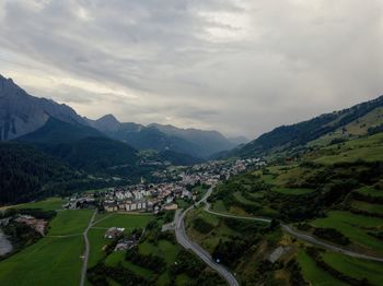 Scenic view of landscape and mountains against sky