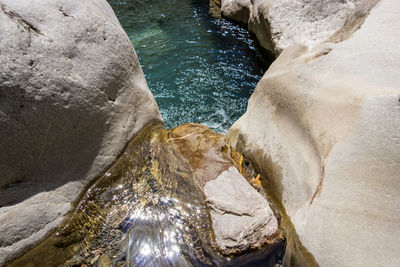 Close-up of rock formation in water