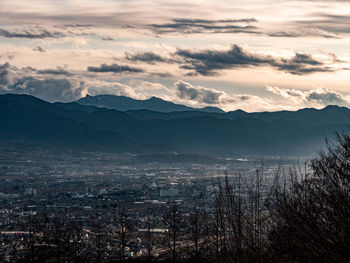 High angle view of cityscape against sky during sunset