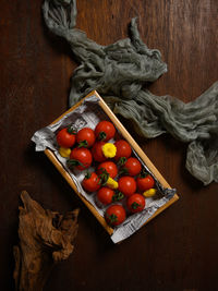 High angle view of fruits in container on table