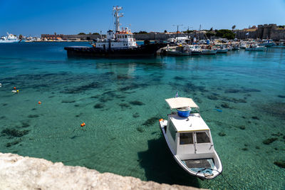 Fishing boats in kolona harbor, the second biggest commercial harbor on the island in rhodes greece.