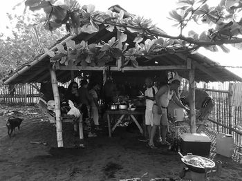 People at market stall