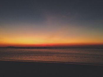 Scenic view of sea at sunset