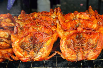 High angle view of meat on barbecue grill