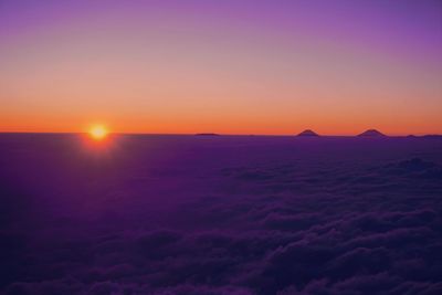 Scenic view of mountains against sky during sunset