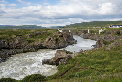 Scenic view of river against sky