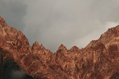 Scenic view of red mountains against sky