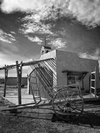 Traditional windmill against sky