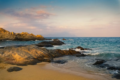 Scenic view of sea against sky during sunset