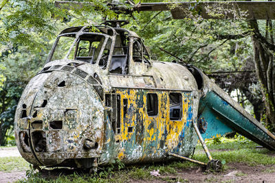 Old abandoned truck on field