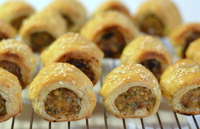 Sausage rolls on rack