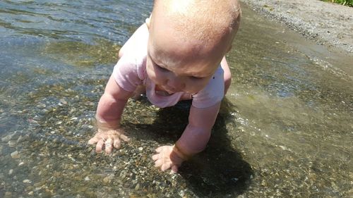 Woman standing in water