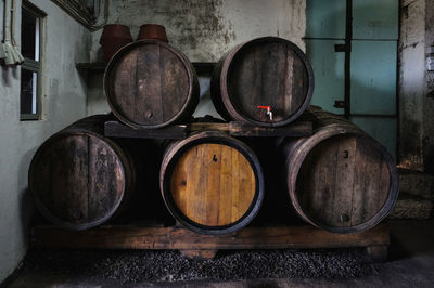 Full frame shot of wine in barrels.