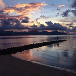 Scenic view of sea at sunset