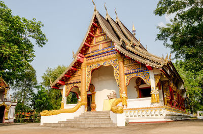 Low angle view of temple against building