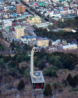 High angle view of street and buildings in city