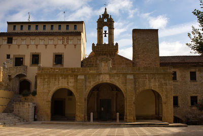 Low angle view of historic building against sky