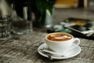 Coffee cup on table