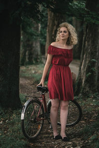 Portrait of young woman in forest