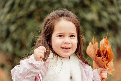 Portrait of cute girl smiling
