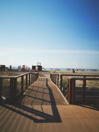 Empty footbridge at beach