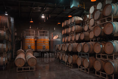 Full frame shot of wine bottles in building