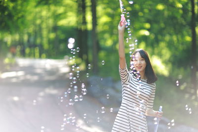 Blurred motion of woman in water