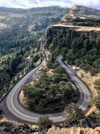 High angle view of winding road and trees