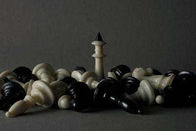 Close-up of balls on table against black background