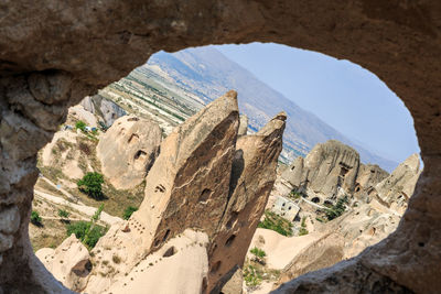 Panoramic view of rock formations against sky