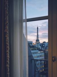 View of cityscape through window