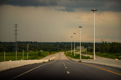 Empty road against sky