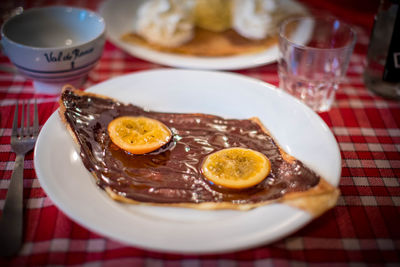 Close-up of breakfast served on table